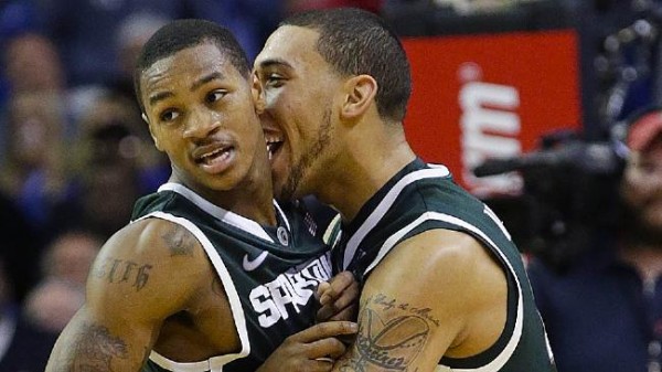 Denzel Valentine (right) had to carve his own identity after Keith Appling (left) graduated (AP Photo/D. Martin)