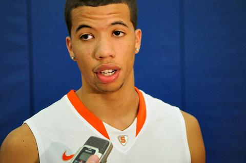 Carter-Williams' steady point guard play helped Syracuse grind out a win at Providence.