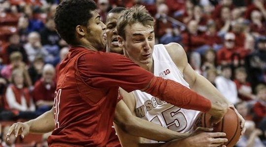 A rugged contest throughout, Sam Dekker and the Badgers earned their first conference road victory of the season (AP)