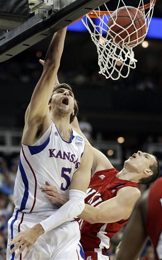 Western Kentucky gave Kansas a ride, but Jeff Withey was the difference and Kansas escaped. (AP/Orlin Wagner)
