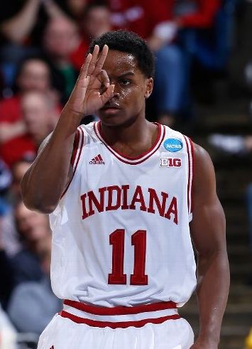 Yogi Ferrell celebrates after making a three point basket against the James Madison Dukes. (Getty)