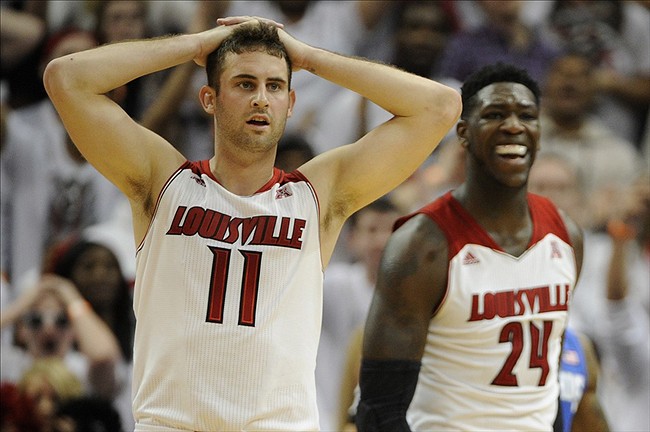 Luke Hancock (left) played his best game since the Final Four, but it wasn't enough for Louisville to beat Memphis. (Jamie Rhodes/USA TODAY Sports)