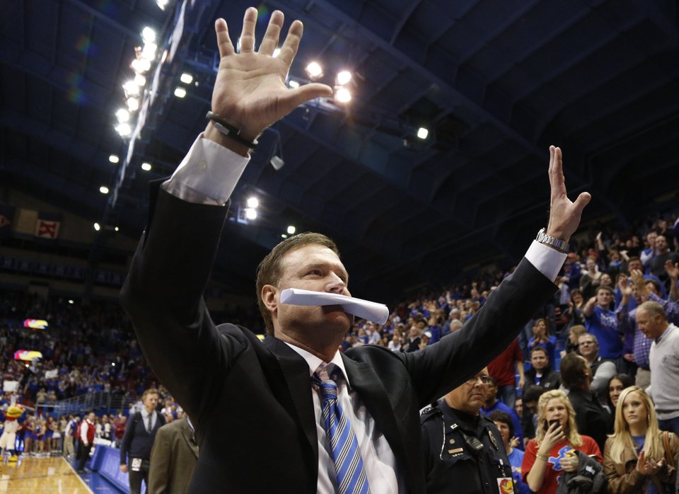 Bill Self celebrates with fans after clinching the Big 12 again. (Nick Krug, Lawrence-Journal World)