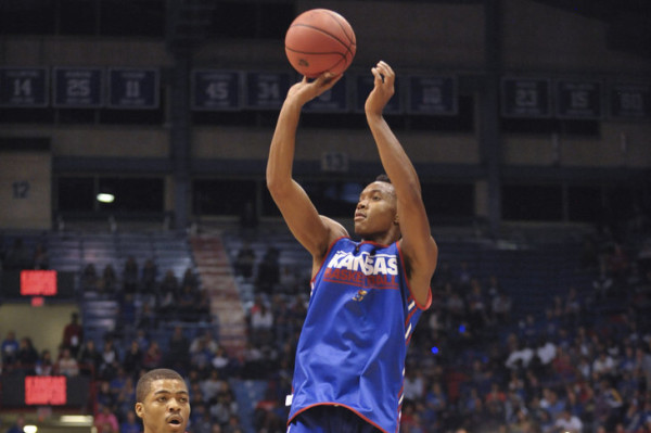 Freshman Devonte' Graham was a late addition to Kansas' standout 2014 recruiting class, but can he shore up a longstanding weakness at the point? (Denny Medley/USA Today Sports)