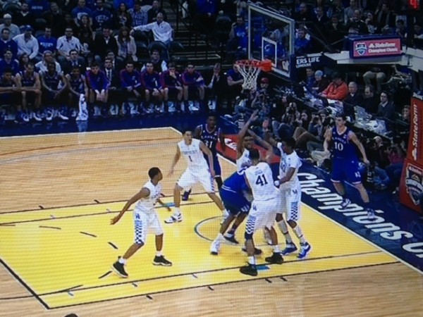 Kentucky swarms the offensive player. 