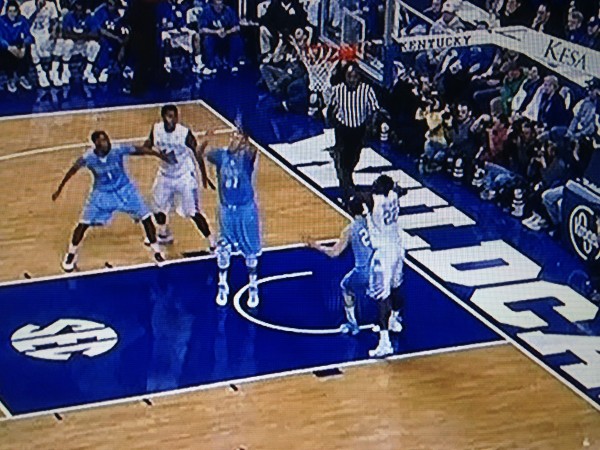 Columbia scouts out the lob and takes it away. 