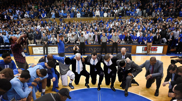The tribute to Dean Smith before the Duke-Carolina game in Durham was the most moving moment of the ACC season. (Chuck Liddy/Raleigh News & Observer)