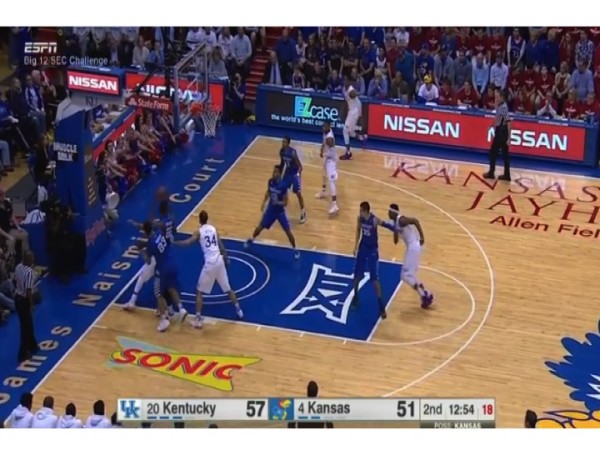 Kentucky's defenders can't do much as Selden goes to the rim. 